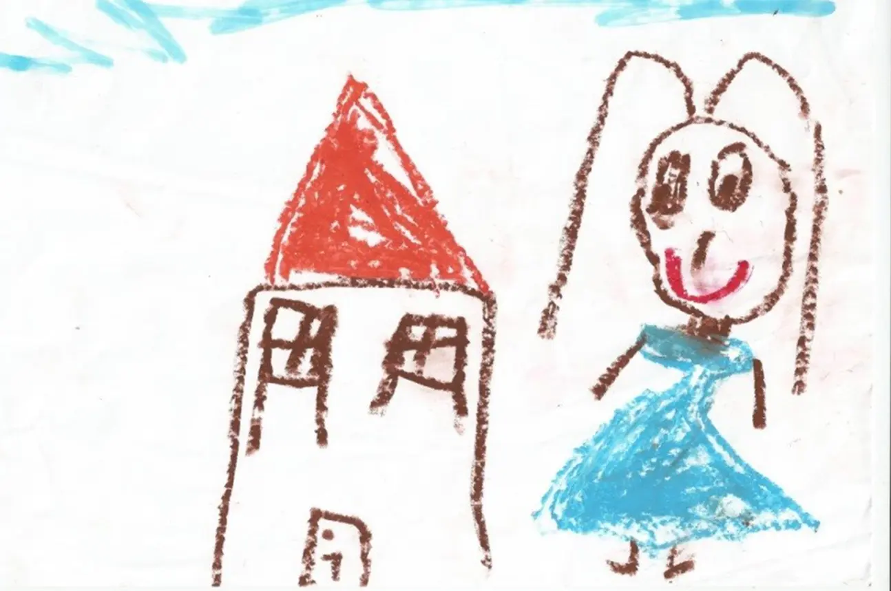 Child's drawing of a figure near a house — expansion stage